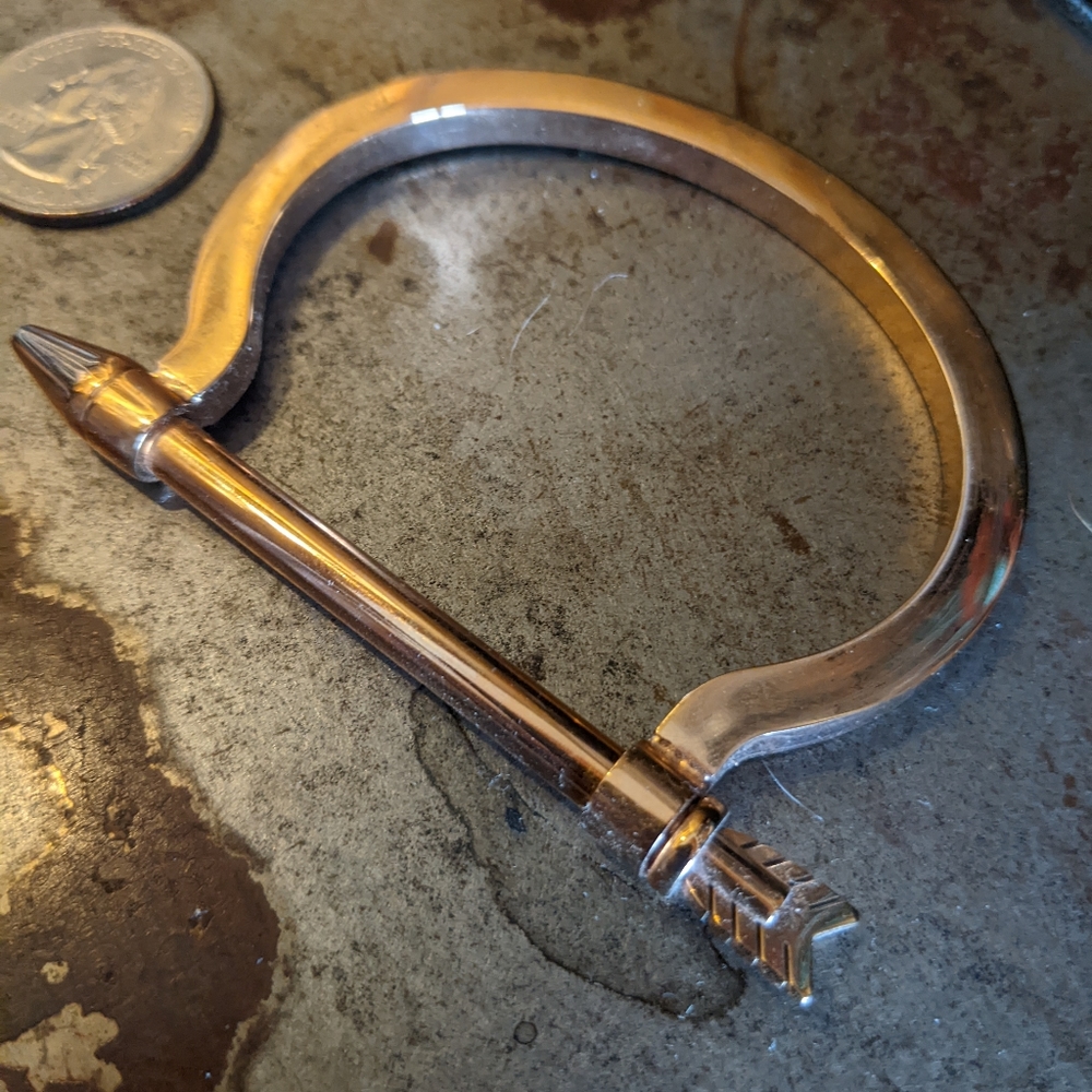 Copper toned arrow cuff bracelet
